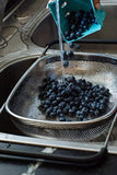 LiveFresh Over the Sink Micro-perforated Stainless Steel 4-Quart Colander with Non-Slip Handle Grips and Rubber Feet - Handles Extend to Fit Any Sink